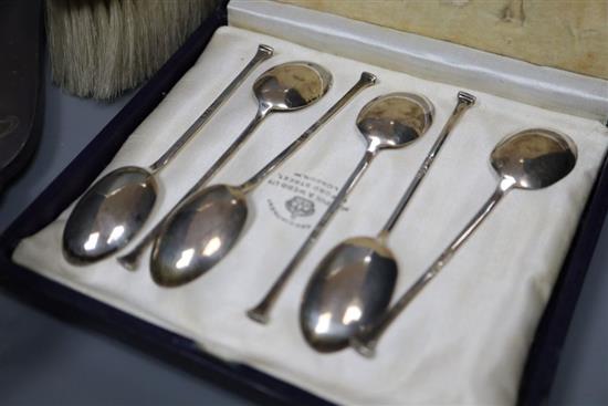 A cased set of six silver coffee spoons, silver mounted dressing table items etc.